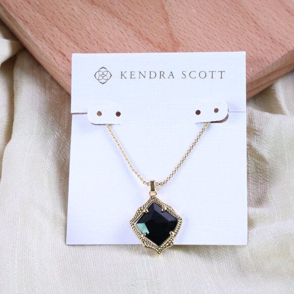 Kendra Scott Kacey Black Opaque Glass Long Pendant Necklace in Gold - Picture 1 of 2